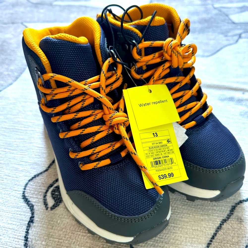 Insulated and water repellent cold weather boots. Brand new. Size 13T.